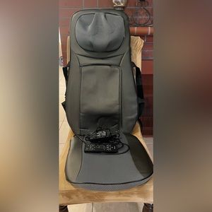 Neck and full back massager with remote control.